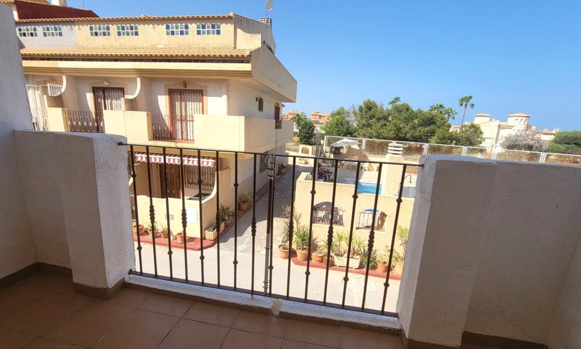 Revânzare - Town House -
Orihuela Costa - Playa Flamenca